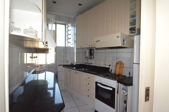 Cozinha de apartamento à venda com 3 quartos, 99m² em Floresta, Porto Alegre