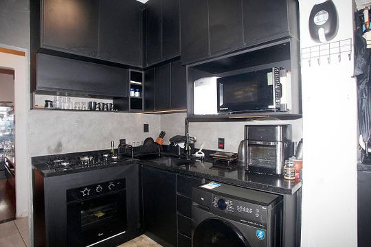 Cozinha e Área de Serviço de apartamento para alugar com 2 quartos, 53m² em Centro Histórico, Porto Alegre