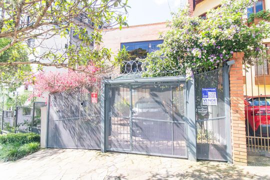 Fachada de casa à venda com 4 quartos, 390m² em Menino Deus, Porto Alegre