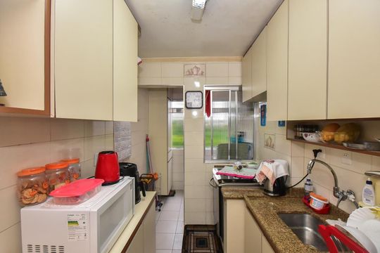 Cozinha de apartamento à venda com 2 quartos, 55m² em Jardim Umarizal, São Paulo