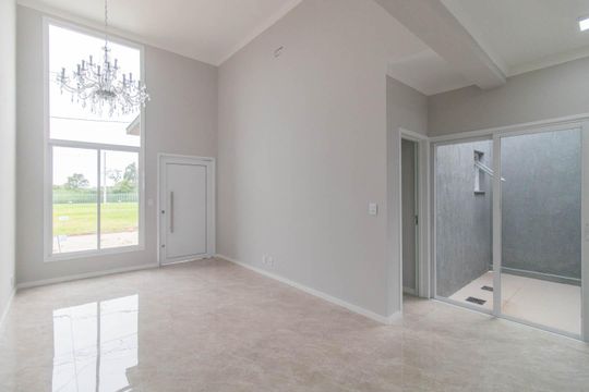 Sala de casa de condomínio à venda com 3 quartos, 89m² em Cavalhada, Porto Alegre