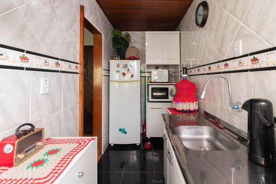 Cozinha de apartamento à venda com 2 quartos, 57m² em Vila Nova, Porto Alegre