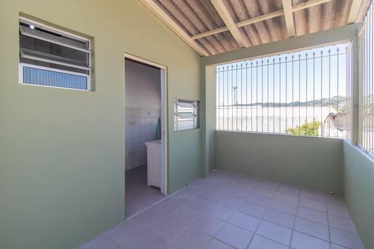 Varanda de casa à venda com 4 quartos, 189m² em Partenon, Porto Alegre