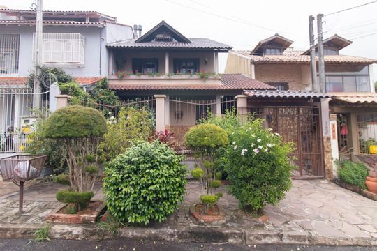 Fachada de casa à venda com 4 quartos, 255m² em Aberta dos Morros, Porto Alegre