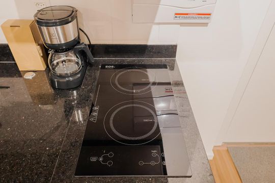 Cozinha de kitnet/studio à venda com 1 quarto, 33m² em Sumaré, São Paulo
