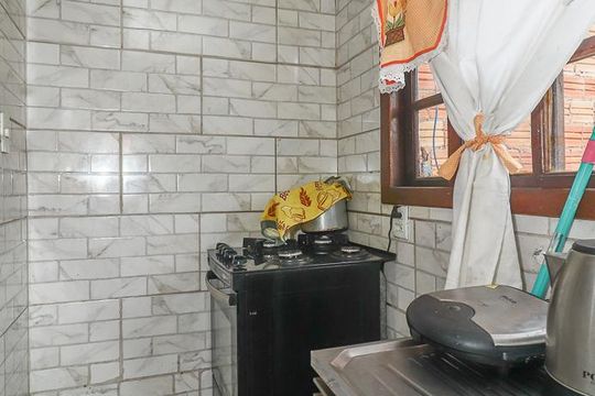 Cozinha de casa à venda com 1 quarto, 100m² em Jardim Carvalho, Porto Alegre