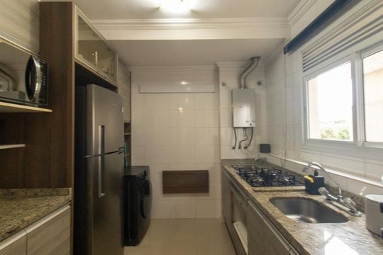 Cozinha e Área de Serviço de apartamento para alugar com 2 quartos, 59m² em Água Verde, Curitiba