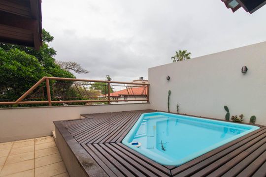 Área comum - Piscina de casa de condomínio à venda com 3 quartos, 340m² em Ipanema, Porto Alegre