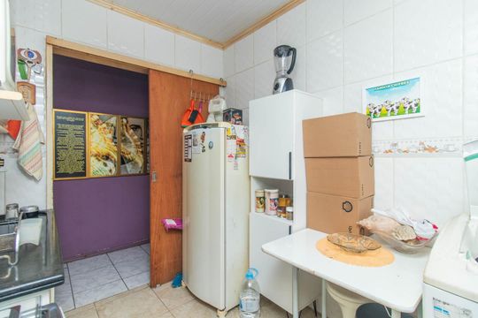 Cozinha de apartamento à venda com 1 quarto, 48m² em Azenha, Porto Alegre