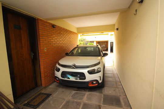 Garagem de casa de condomínio à venda com 3 quartos, 117m² em Medianeira, Porto Alegre