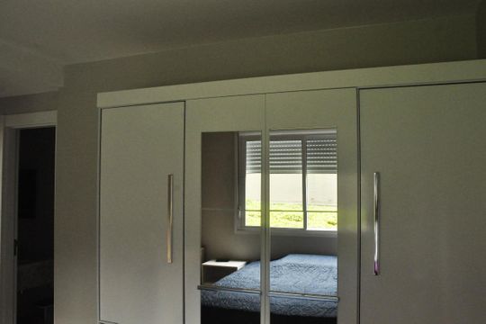 Quarto de apartamento à venda com 1 quarto, 56m² em São Geraldo, Porto Alegre