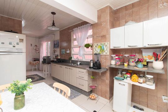 Cozinha de casa de condomínio à venda com 3 quartos, 194m² em Espírito Santo, Porto Alegre