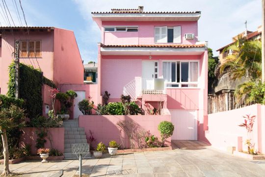 Fachada de casa de condomínio à venda com 3 quartos, 194m² em Espírito Santo, Porto Alegre