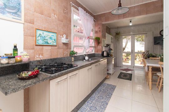 Cozinha de casa de condomínio à venda com 3 quartos, 194m² em Espírito Santo, Porto Alegre