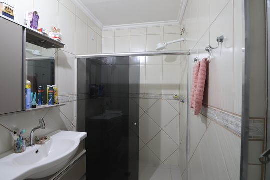 Banheiro da Suíte 1 de casa à venda com 4 quartos, 180m² em Marechal Rondon, Canoas