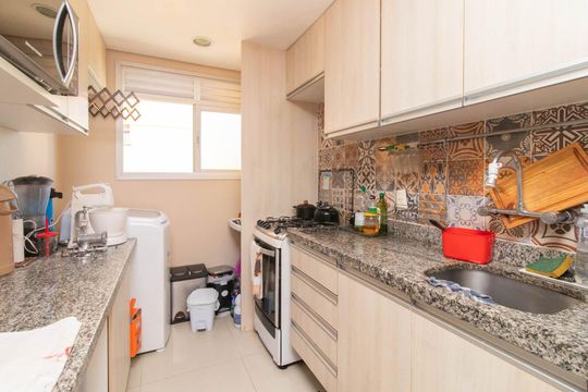 Cozinha de apartamento à venda com 2 quartos, 64m² em Nonoai, Porto Alegre