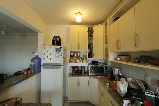 Cozinha de apartamento à venda com 3 quartos, 104m² em São Geraldo, Porto Alegre