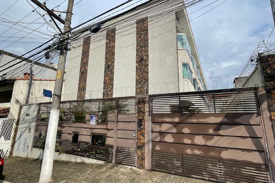 Fachada+Placa de casa de condomínio à venda com 2 quartos, 90m² em Vila Granada, São Paulo