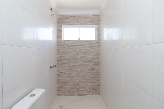 Banheiro da Suíte de casa à venda com 3 quartos, 185m² em Guarujá, Porto Alegre