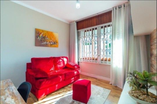 Sala de casa para alugar com 3 quartos, 380m² em Guarujá, Porto Alegre