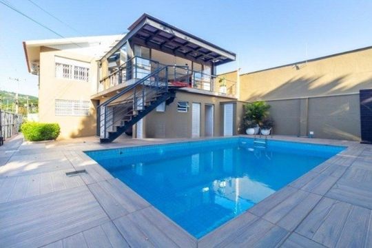 Área comum de casa para alugar com 3 quartos, 380m² em Guarujá, Porto Alegre