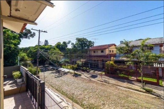 Vista Suíte 1 de casa para alugar com 3 quartos, 380m² em Guarujá, Porto Alegre