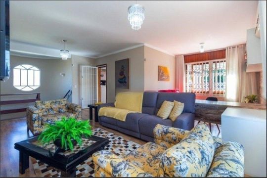 Sala de casa para alugar com 3 quartos, 380m² em Guarujá, Porto Alegre