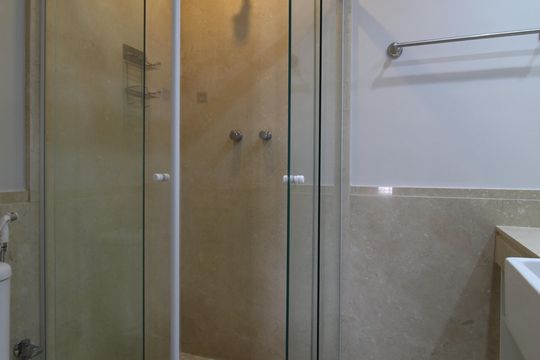 Banheiro da Suíte de apartamento para alugar com 1 quarto, 62m² em Itaim Bibi, São Paulo