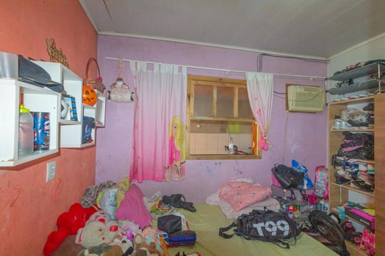Quarto 2 de casa à venda com 3 quartos, 150m² em Guajuviras, Canoas