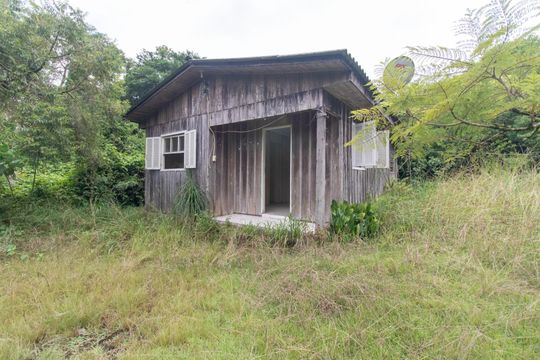 Fachada de casa à venda com 2 quartos, 45m² em Vila Nova, Porto Alegre