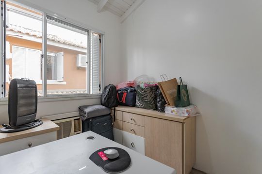 Quarto 3 de casa de condomínio à venda com 3 quartos, 86m² em Jardim Itu, Porto Alegre