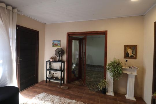 Sala de casa para alugar com 3 quartos, 100m² em  Rio Branco, Canoas