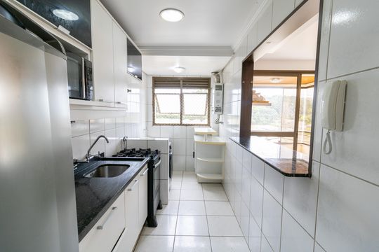 Cozinha e Área de Serviço de apartamento à venda com 2 quartos, 60m² em Partenon, Porto Alegre