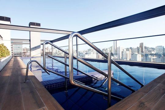 Área Comum - Piscina de kitnet/studio à venda com 2 quartos, 75m² em Auxiliadora, Porto Alegre