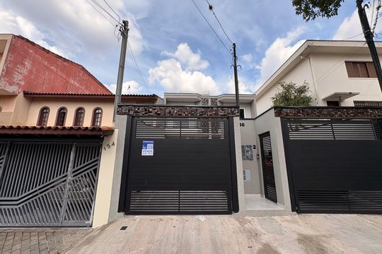 Fachada + plaquinha de casa à venda com 4 quartos, 132m² em Utinga, Santo André
