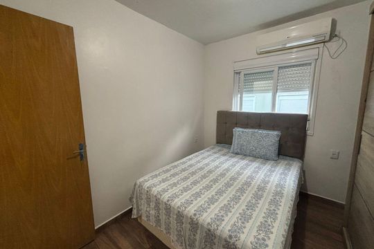 Dormitório 1 de apartamento à venda com 2 quartos, 48m² em Rondônia, Novo Hamburgo