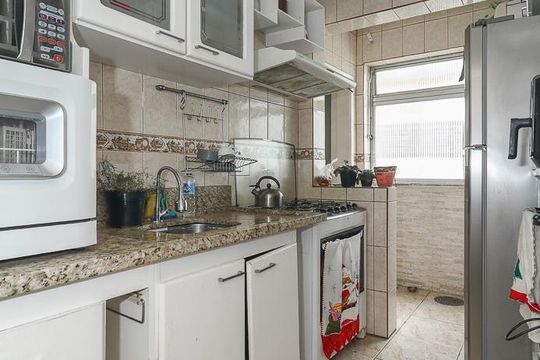 Cozinha de apartamento à venda com 3 quartos, 86m² em São João, Porto Alegre