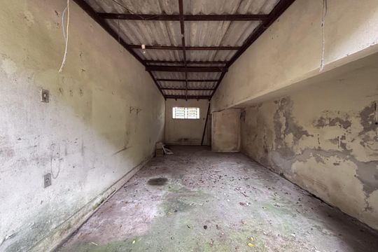 Garagem de casa de condomínio à venda com 2 quartos, 200m² em Campo Novo, Porto Alegre