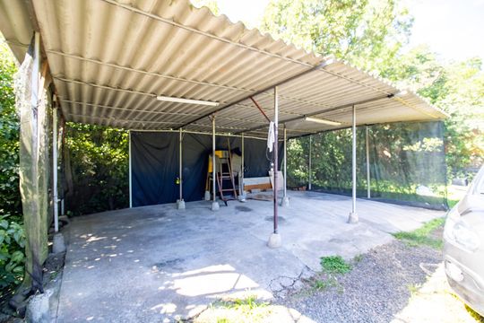 Garagem de casa à venda com 3 quartos, 100m² em Vila Nova, Porto Alegre