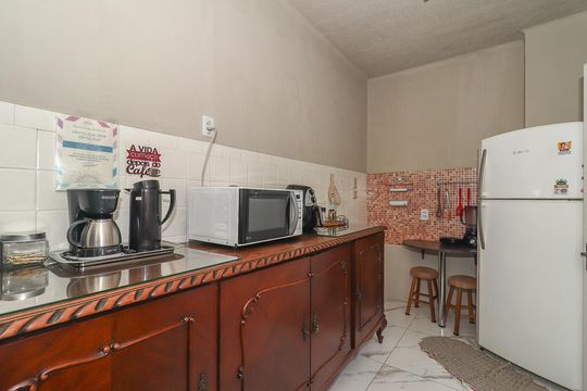 Cozinha de apartamento à venda com 3 quartos, 98m² em Auxiliadora, Porto Alegre