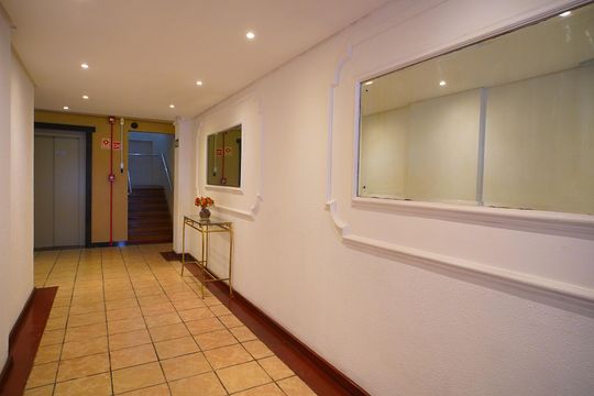 Hall de entrada de apartamento à venda com 3 quartos, 127m² em Santana, Porto Alegre