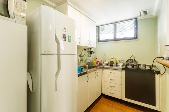 Cozinha de apartamento à venda com 2 quartos, 71m² em Itaim Bibi, São Paulo