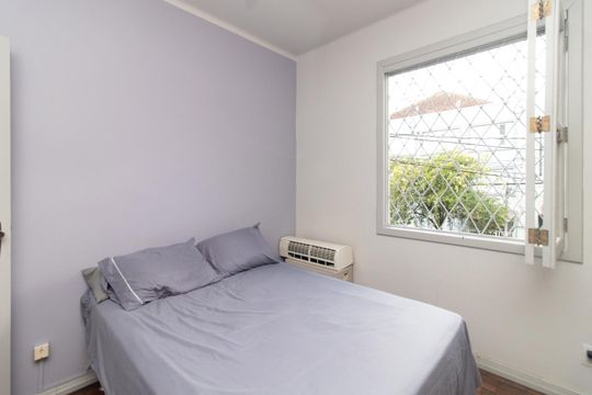 Quarto 1 de apartamento à venda com 2 quartos, 64m² em Santo Antônio, Porto Alegre
