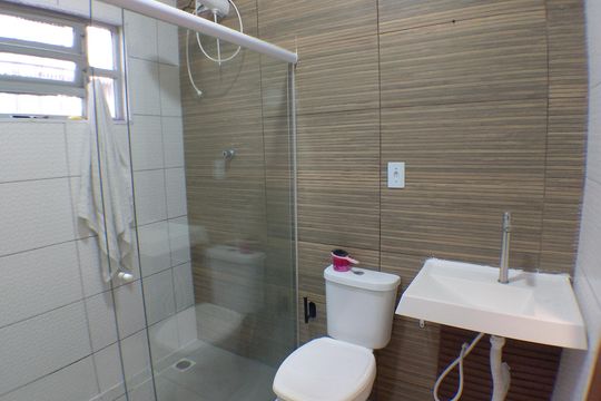 Banheiro  de casa para alugar com 3 quartos, 150m² em Maracanã, Praia Grande
