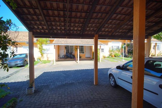Sala - Vista de casa de condomínio à venda com 3 quartos, 70m² em Jardim Dona Leopoldina, Porto Alegre