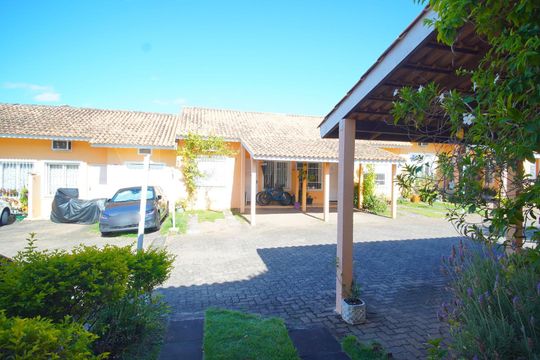 Quarto 1 - Vista de casa de condomínio à venda com 3 quartos, 70m² em Jardim Dona Leopoldina, Porto Alegre
