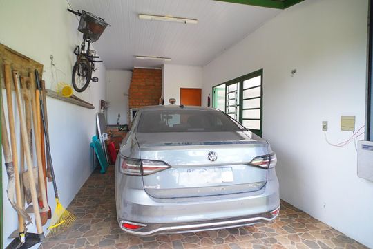 Garagem de casa à venda com 5 quartos, 535m² em Vila Nova, Porto Alegre