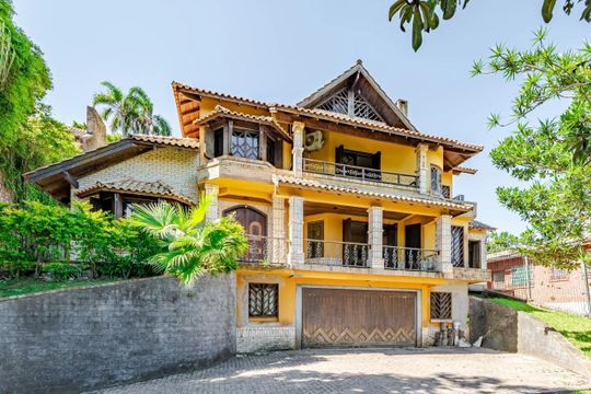 Fachada de casa à venda com 5 quartos, 460m² em Vila Conceição, Porto Alegre