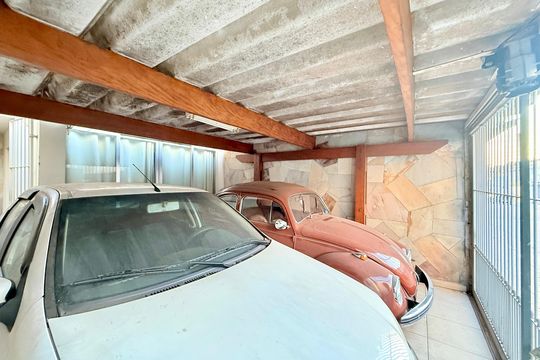 Garagem de casa à venda com 3 quartos, 115m² em Campo Belo, São Paulo