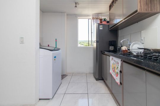Cozinha e Área de Serviço de apartamento para alugar com 2 quartos, 55m² em Vila Nova, Porto Alegre